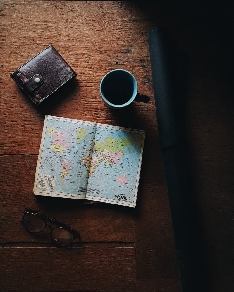 Wallet, map, coffee, glasses