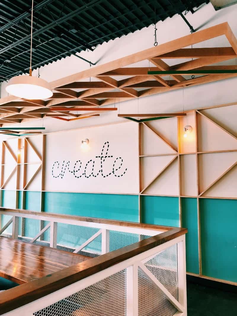 The word "create" on a wall